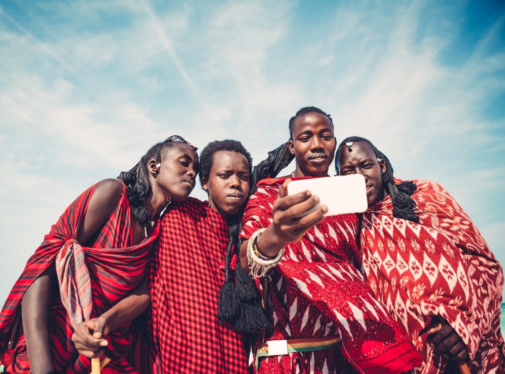 People looking at smartphone