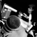 A recording room with a microphone. Free Thoughts Podcast with Marian L. Tupy